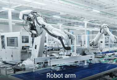 robot arms doing assembly in a manufacturing production line
