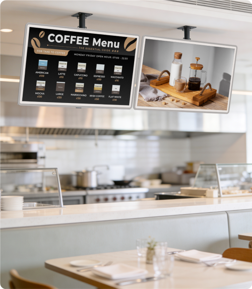Ceiling-mounted promotional signage in a shop