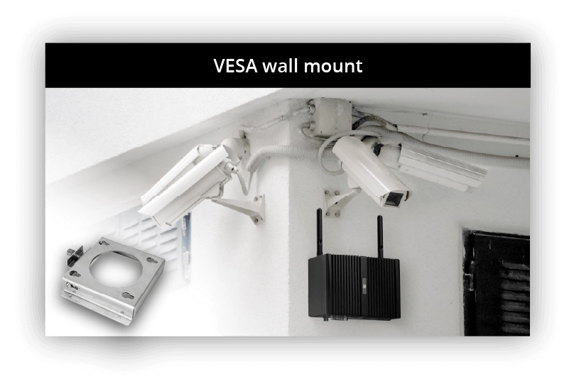 uIBX-260 box pc mounted on a wall beside surveillance cameras by using VESA wall mount kit